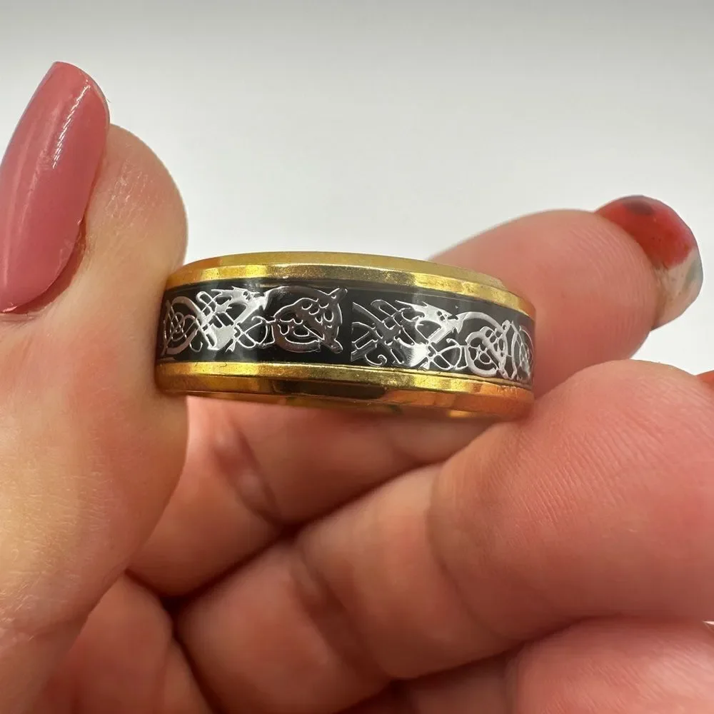 Men's size 12.5 yellow gold tone with black center/silver scroll work, ring!‎